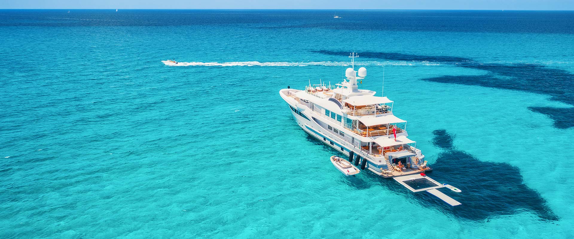 fci watermakers background yacht blue water