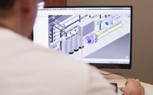 fci watermakers engineer at computer